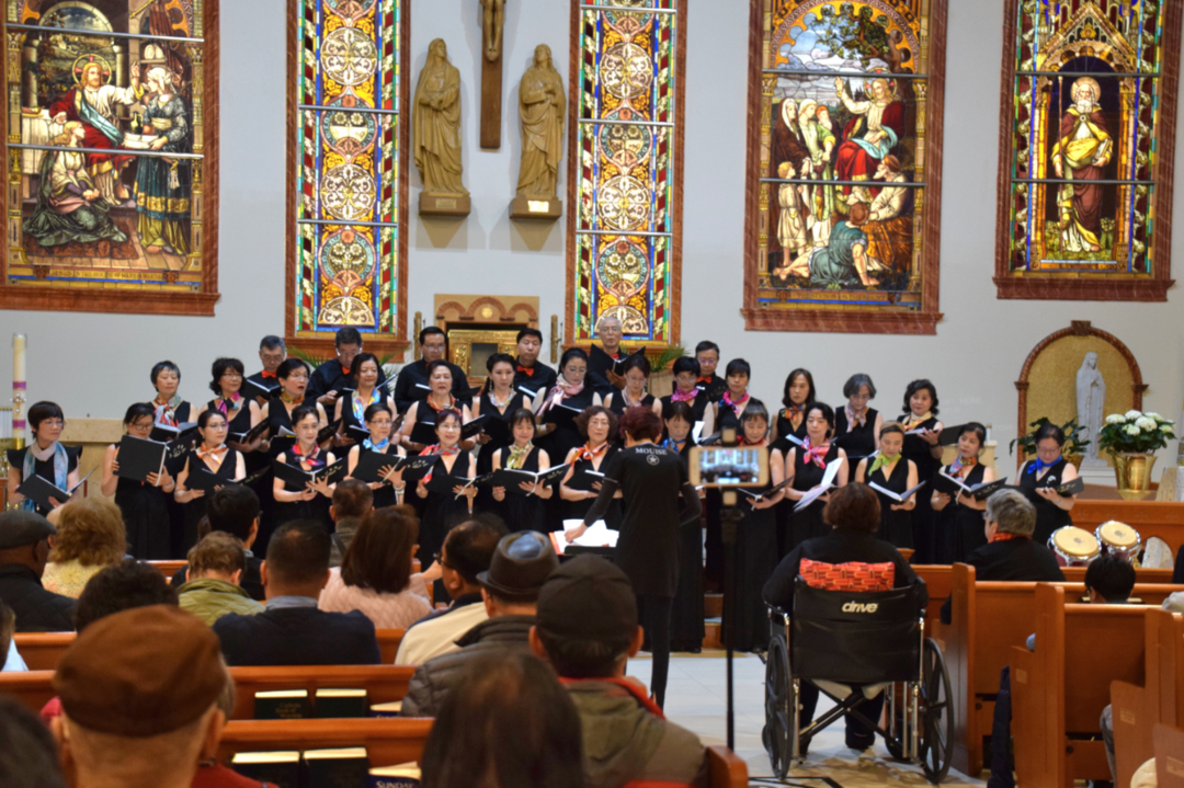 A group of people performing in a church

AI-generated content may be incorrect.